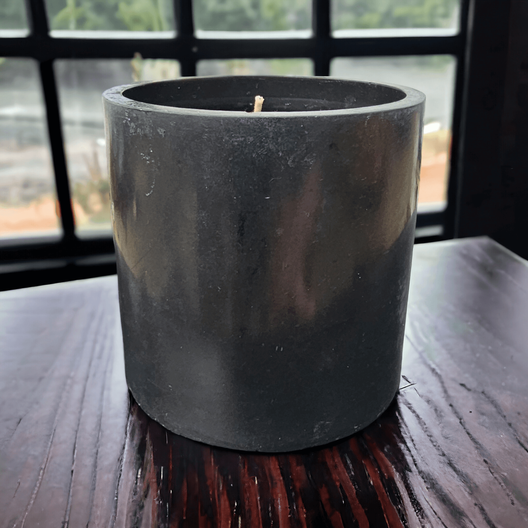 Flamingwick Candle Shop's cement vessel candle 🍎  apple cinnamon scented 